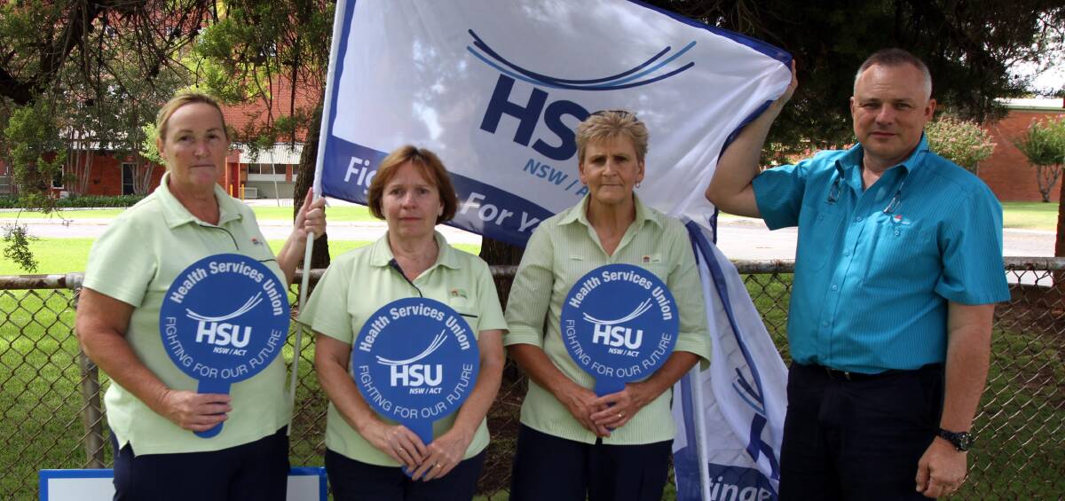 ACTION: Leeton District Hospital staff (from left) Shirley Quinn, Helen Herbert, Shirley Rose and HSU site representative Michael Kidd protest against privatisation.
