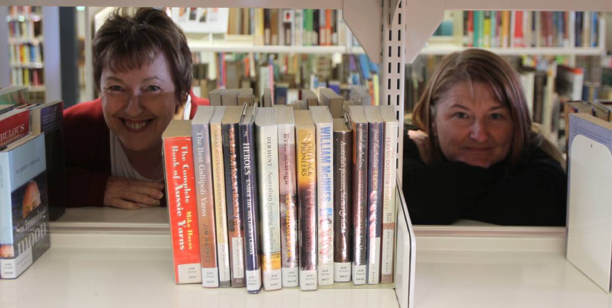 STANDING ALONE: Leonie Murphy and Jo Pianca are delighted that the Leeton library will be remaining as is for now. Picture: Riley Krause.