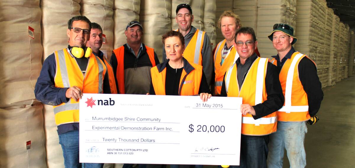 WELCOME BOOST: Southern Cotton's Kate O'Callaghan hands over a cheque for $20,000 to Murrumbidgee Shire Community Demonstration Farm. Picture: Supplied