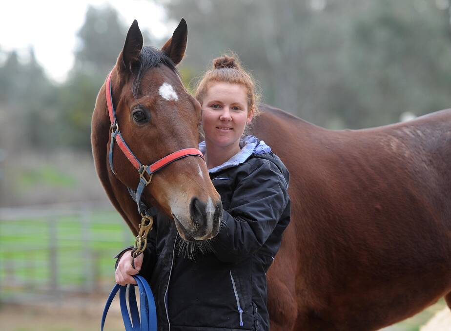 STABLE FAVOURITE: Stephanie Sutherland with Benno's Boy ahead of his assignment in the $12,000 Narrandera Cup (1400m) on Saturday. Picture: Laura Hardwick