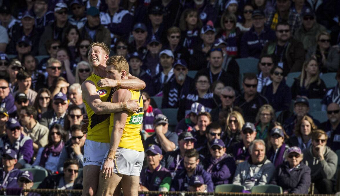 WELL DONE: Jacob Townsend is congratulated by Jack Riewoldt after one of his six goals against Fremantle on Saturday. Picture: AAP