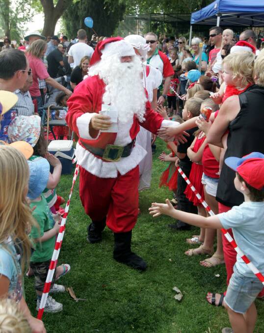 THE arrival of Santa Claus by sports car is always a highly anticipated launch into the Light Up Leeton Christmas Carnival.