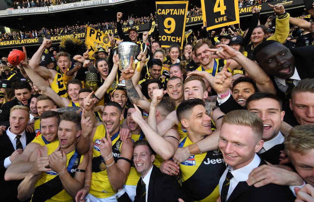 THE Richmond Football Club, its members and fans celebrated a drought-breaking and unexpected premiership. Photo - AAP Image/Julian Smith
