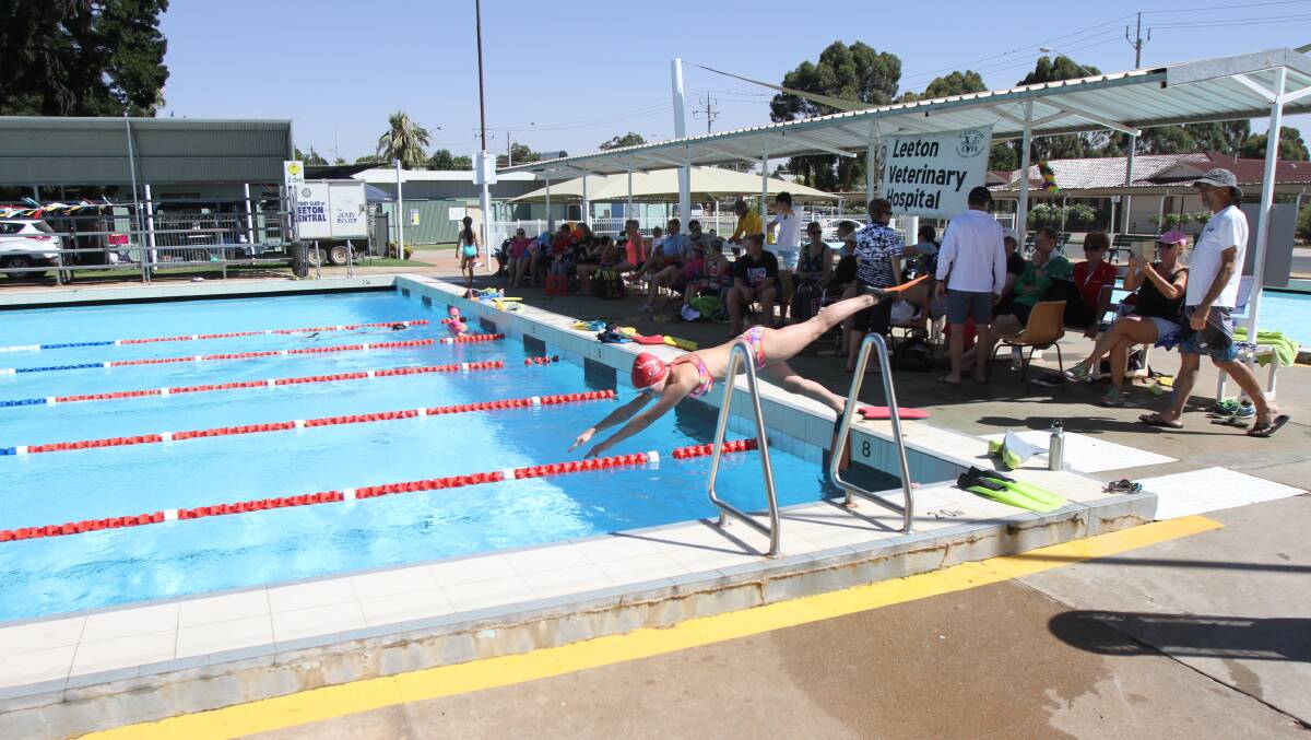 EQUIPMENT NEEDED: Participants taking part in the MS Mega Swim where a female fell ill leading to calls for a defibrillator to be placed at the Leeton Pool. Photo: Ron Arel