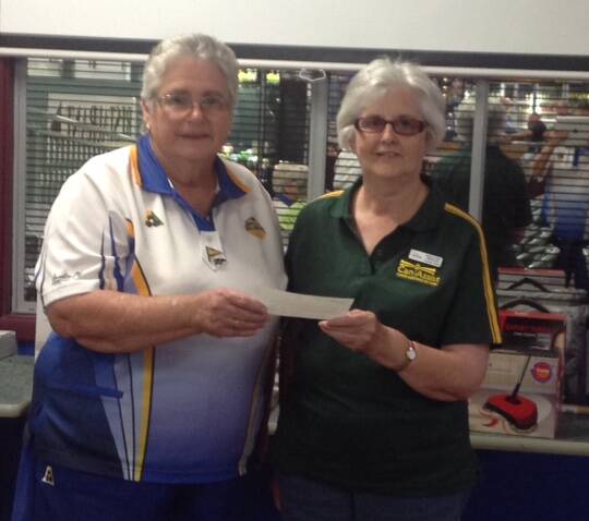 DONATION: L&D president Lorraine Mullins presents a cheque of $375 to Phyllis Guthrie on behalf of Can Assist. Picture: Contributed