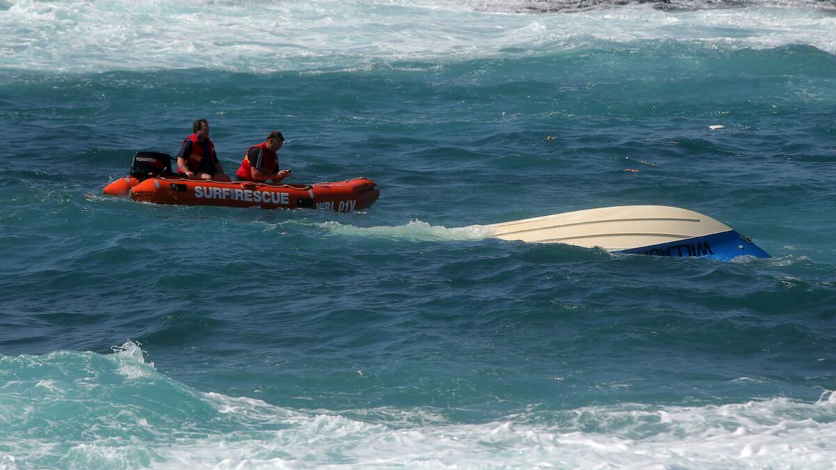 Two men in their 70s have drowned after their boat capsized near the Warrnambool on Friday. Photos: Rob Gunstone.