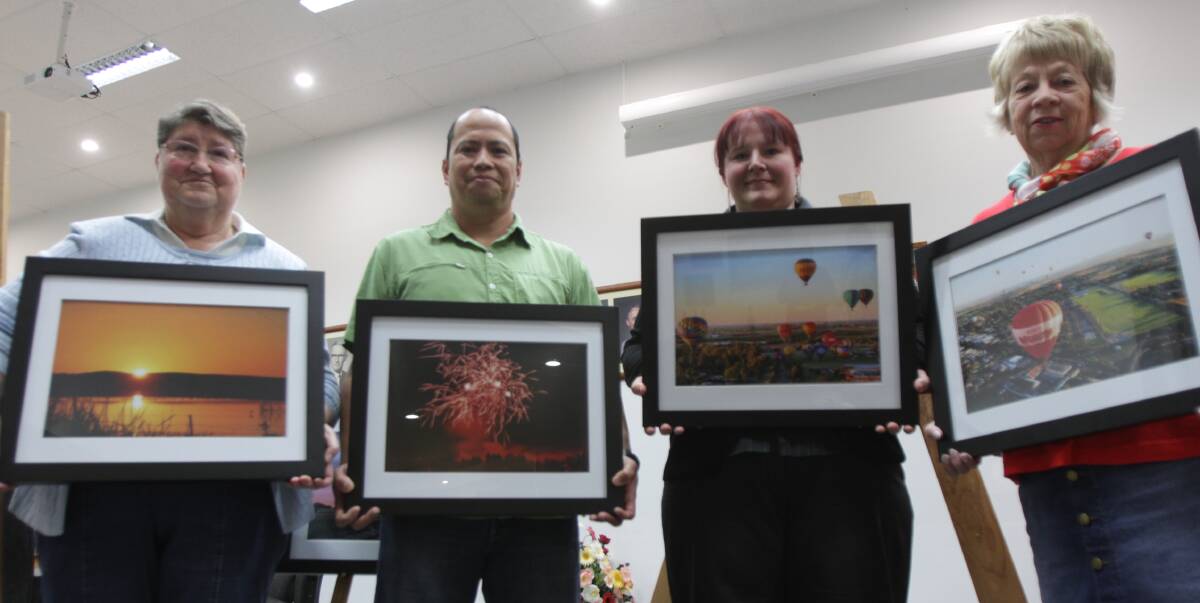 BRIGHT SPARK: Dianne Swaffield, Ian Gabriel, Leah Shelton and Anne Lepper show off their prize winning pieces of art. Picture: Riley Krause.