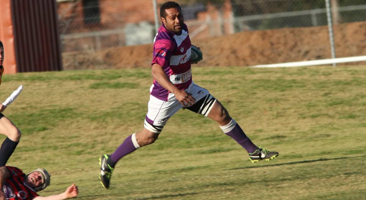 DESTRUCTION IN HIS WAKE: Joe Kafoa-Pene on his way to cross the line for a try during last Saturday's match against the Tumut Bulls
