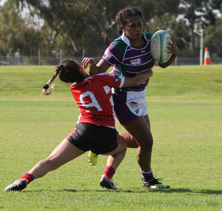 OUT OF MY WAY: Tinai Baravilalla tries to out manoeuvre her CSU Reddies oppositions during an earlier match this season.  