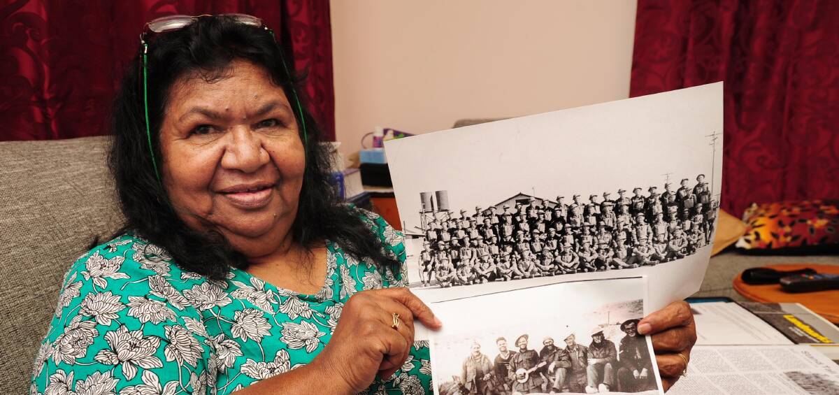 HAPPIER TIMES: Stolen Generation survivor Fay Clayton-Mosely with pictures of her family before they were split up. Ms Clayton-Mosely was taken from her family in Leeton. 