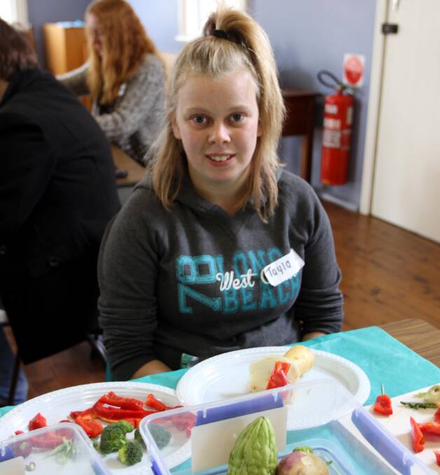 GOOD TIMES: Tayla Orr, 14, enjoys "Messy Church" at St Peter's Anglican Church last Sunday. 