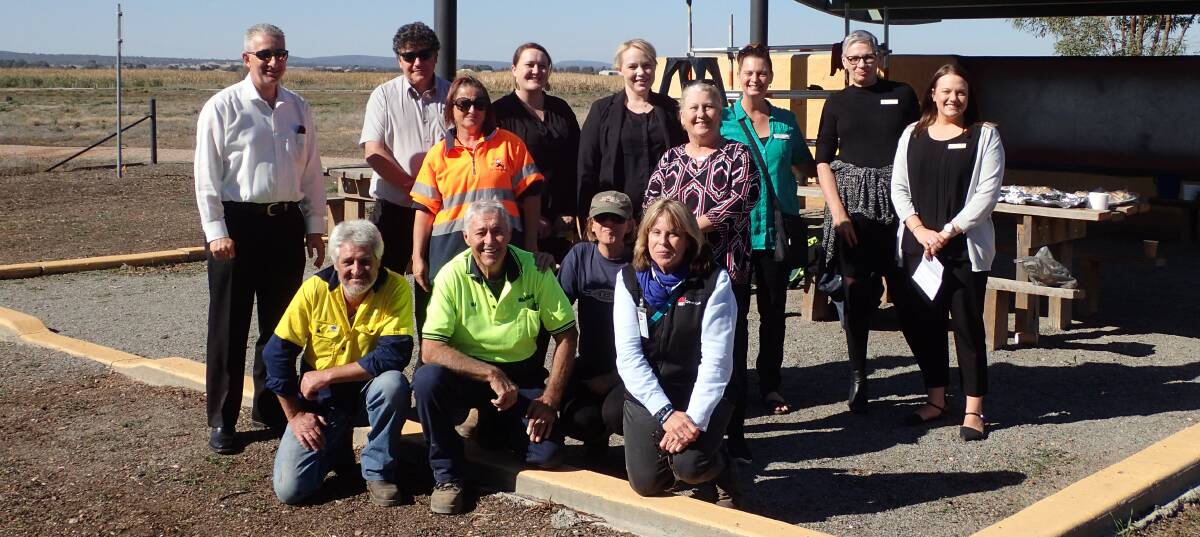 TOP EFFORT: Project stakeholders congratulate those who were part of the recent Work for the Dole program at Fivebough Wetlands. 
