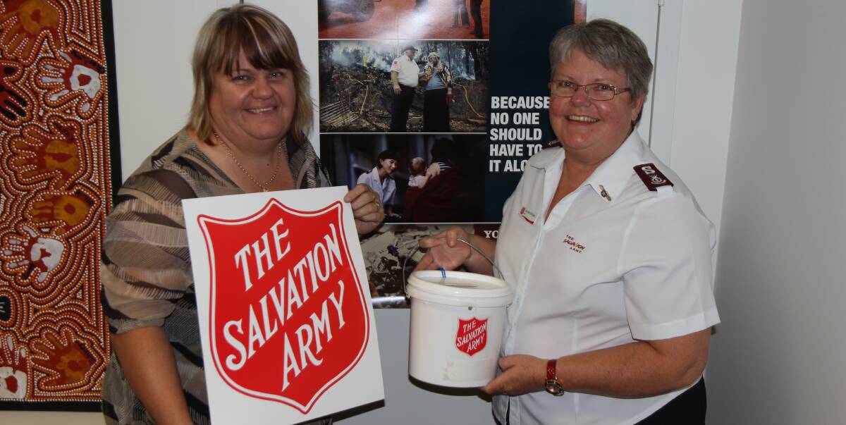 DOOR KNOCK: The Salvation Army, including Leeton's crisis co-ordinator Narelle Weymouth (left) and Captain Jennifer Stringer are celebrating 50 years of the Red Shield Appeal. 