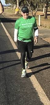 BIG EFFORT: BILL Van Nierop smiles during his walk, which will reach Leeton on Friday evening. Photo: Contributed 