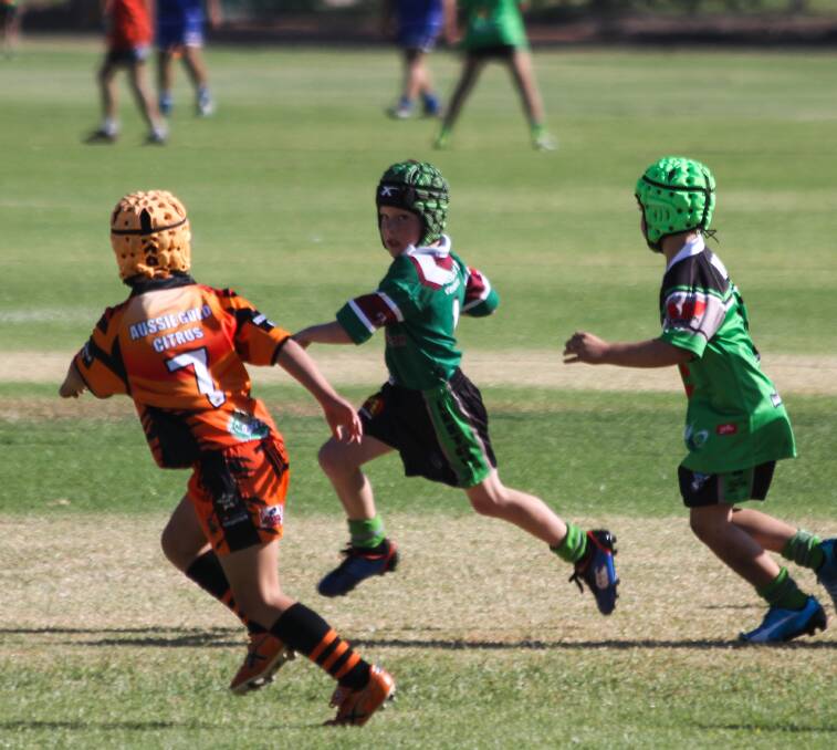 RUN:  Cayden Hillier in his match against the Warratahs at the carnival in Leeton last Saturday. 