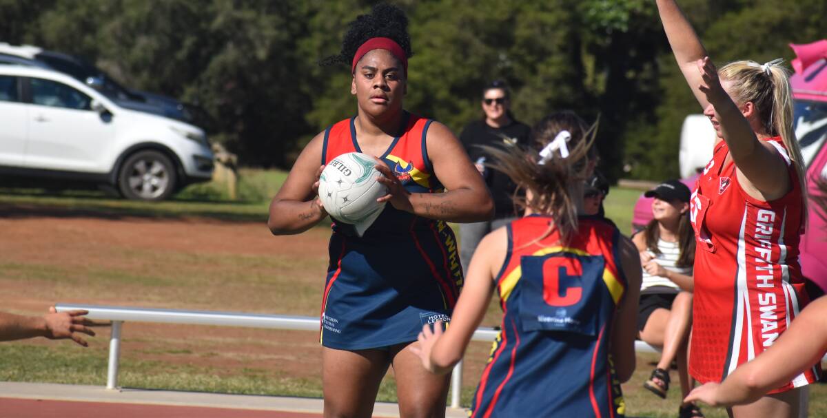 Leeton-Whitton's Grace Korovata prepares to send this pass off during her team's match against the Griffith Swans last weekend. Picture by Liam Warren