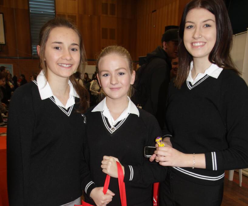 LOOKING AROUND: LHS year 11 students (from left) Shanay Pizzolante, Dannielle Corney and Hannah Bennett at the expo. Photo: Talia Pattison 