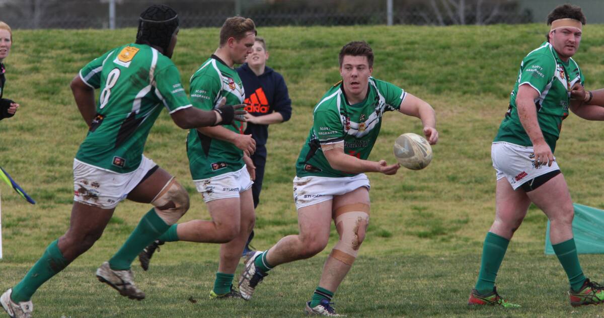 OPTIONS: Greens dummy-half Jack McDonell looks to offload this pass during his side's loss to the Griffith Black and White Panthers on Sunday at No.1 Oval. 