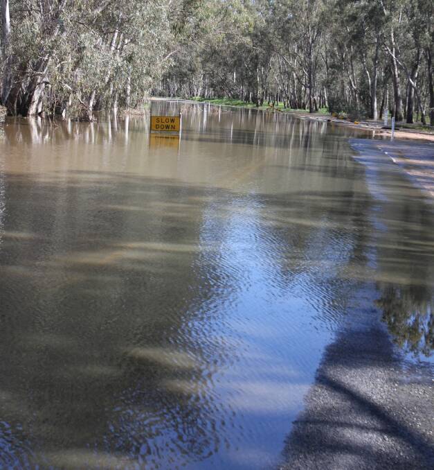 NO WAY THROUGH: Euroley Road remains closed to vehicles. Residents have again been reminded to steer clear of floodwaters. Photo: Talia Pattison 