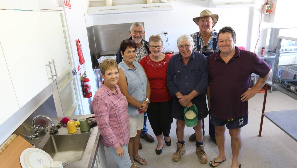 JOB WELL DONE: Paul Maytom, Lorna Robertson and Glen Malone, Trish Preston, Uvonne Morriss, Michael Sparks and Smiley Morriss at the barbecue. 