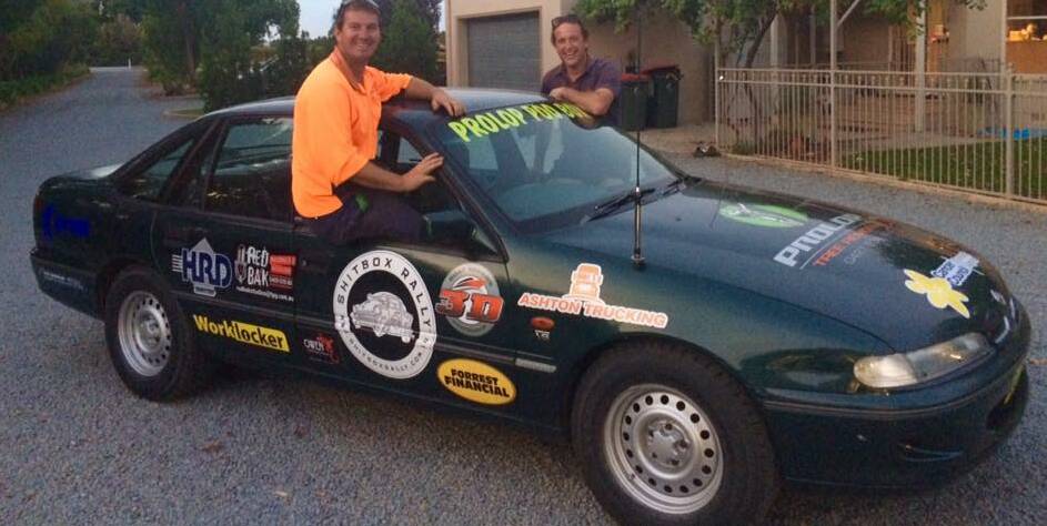 OFF THEY GO: Leeton's Brett Deaton (left) and Richard Ashton are taking part in this year's Shitbox Rally, which raises funds for the Cancer Council. Photo: Contributed 