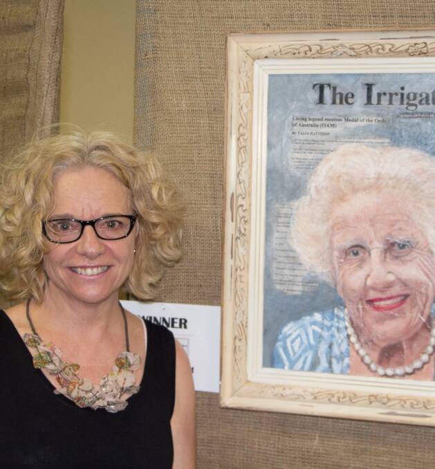 CREATIVE: Leeton Art Society president Ann Rayment at last year's exhibition with her piece that won her the encouragement award. 