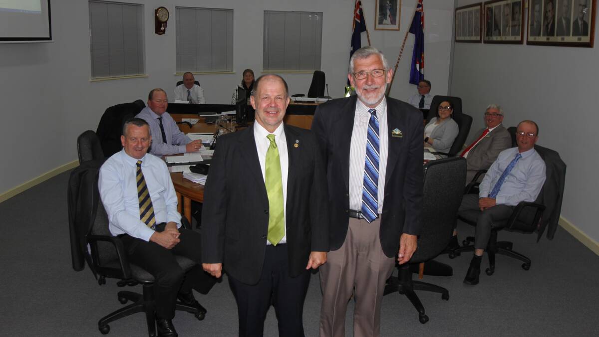 Leeton Shire Council deputy mayor George Weston (left) and mayor Paul Maytom were both re-elected unopposed during Wednesday night's council meeting. 