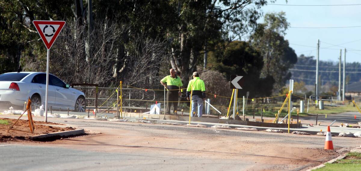 ALL HAPPENING: Construction of a roundabout at the intersection of Petersham and Almond roads is almost complete.