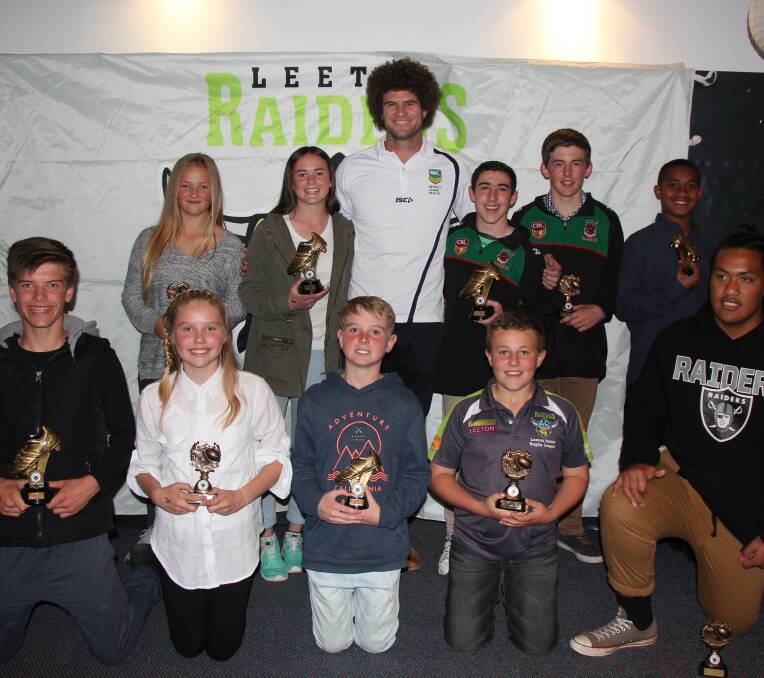 KING OF THE KIDS: Matt King with some of the night's award winners at the junior league presentation night. 