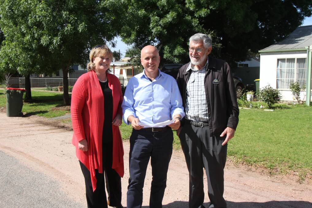 NEW PROJECT: Leeton Shire Council general manager Jackie Kruger (left) and mayor Paul Maytom (right) with Member for Murray Adrian Piccoli discussing the funding announcement for to construct a reticulated sewerage system in Wamoon.