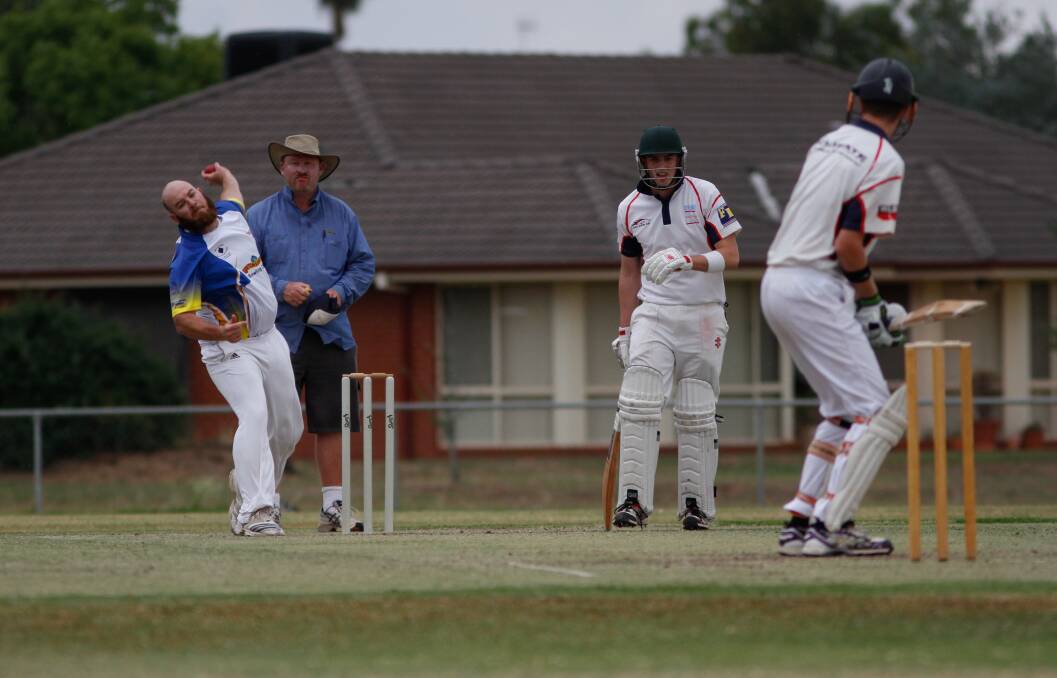 GAME ONE: Ferrets bowler Ben Elwin fires down a delivery during a match against the Colts last season. 