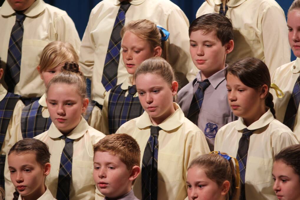 MUSICAL ABILITIES: Leeton Public School's choir competes at the Leeton Eisteddfod on Wednesday morning. Photo: Talia Pattison 