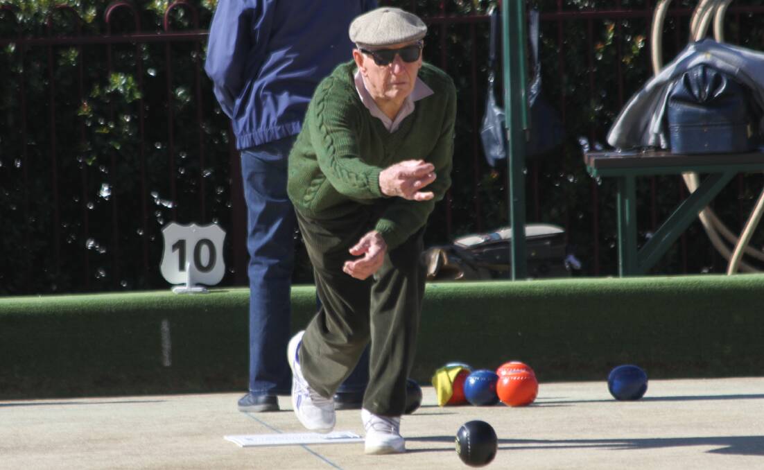 DOWN THE LINE: Bill Watt sends his shot down during the recent mixed pairs tournament at the Leeton and District Bowling Club. Photo; Ron Arel 