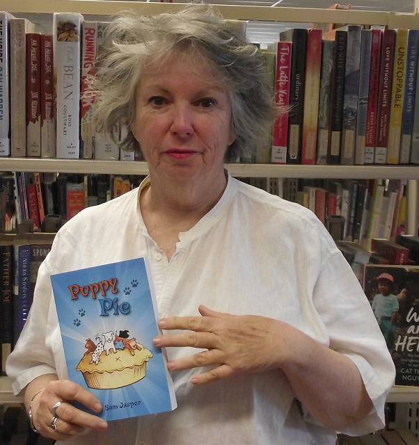 Alicia Braithwaite with her book Puppy Pie. Ms Braithwaite is a former Leeton resident and she will return to town this week as a guest speaker at the first meeting of U3A. Photo: Contributed 