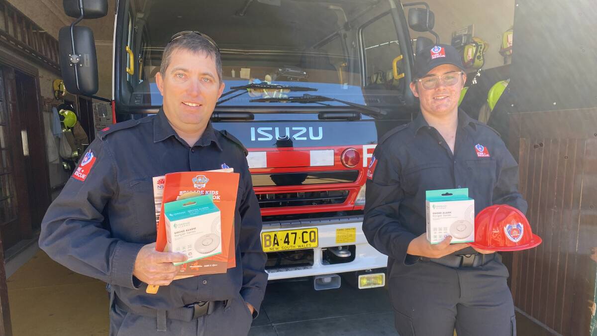 Leeton Fire and Rescue Deputy Captain Leigh Taylor (left) and retained firefighter William Holden are hoping the community heads along to the town's station on Saturday for the annual open day event. Picture by Talia Pattison