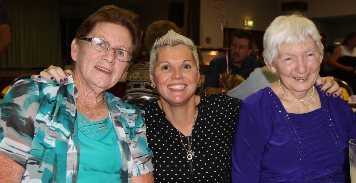 CATCHING UP: Margaret Reed, Kylie Reay and Pat Wagschall are all smiles at the Wamoon Public School centenary dinner on Saturday night. 