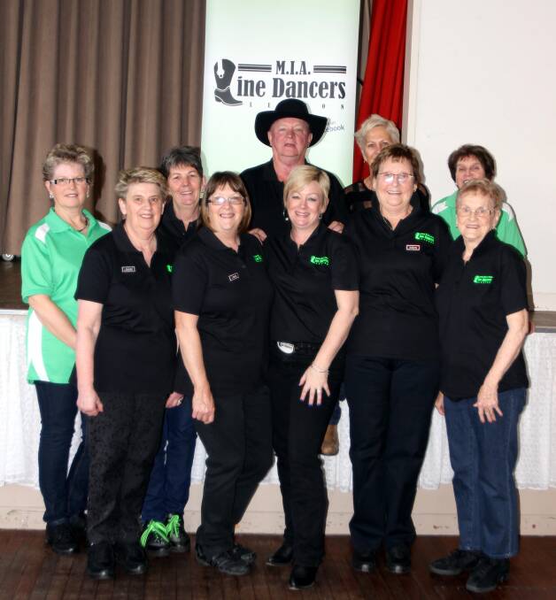 FUN: Line dance workshop participants from the MIA Line Dancers group picked up new skills at the recent event. 