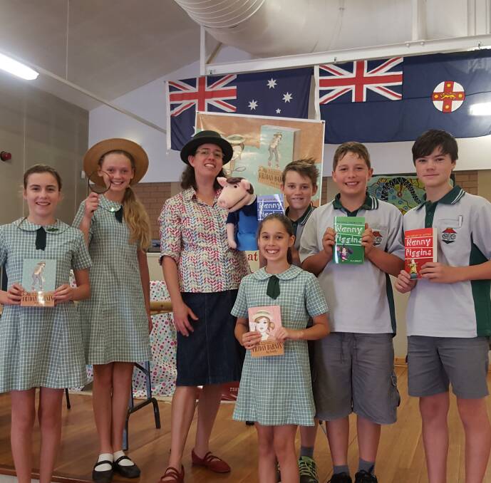 GOOD TIMES: RA Spratt (third from left) with students from Parkview Public School during a visit to the shire recently. 