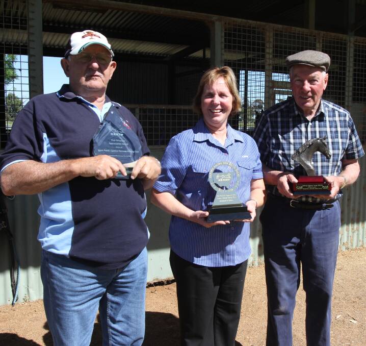 WHAT A HAUL: Leeton Harness Racing Club's (from left) Bob Pettit, Joanne Punch and David Eurell with their awards. Photo: Talia Pattison 