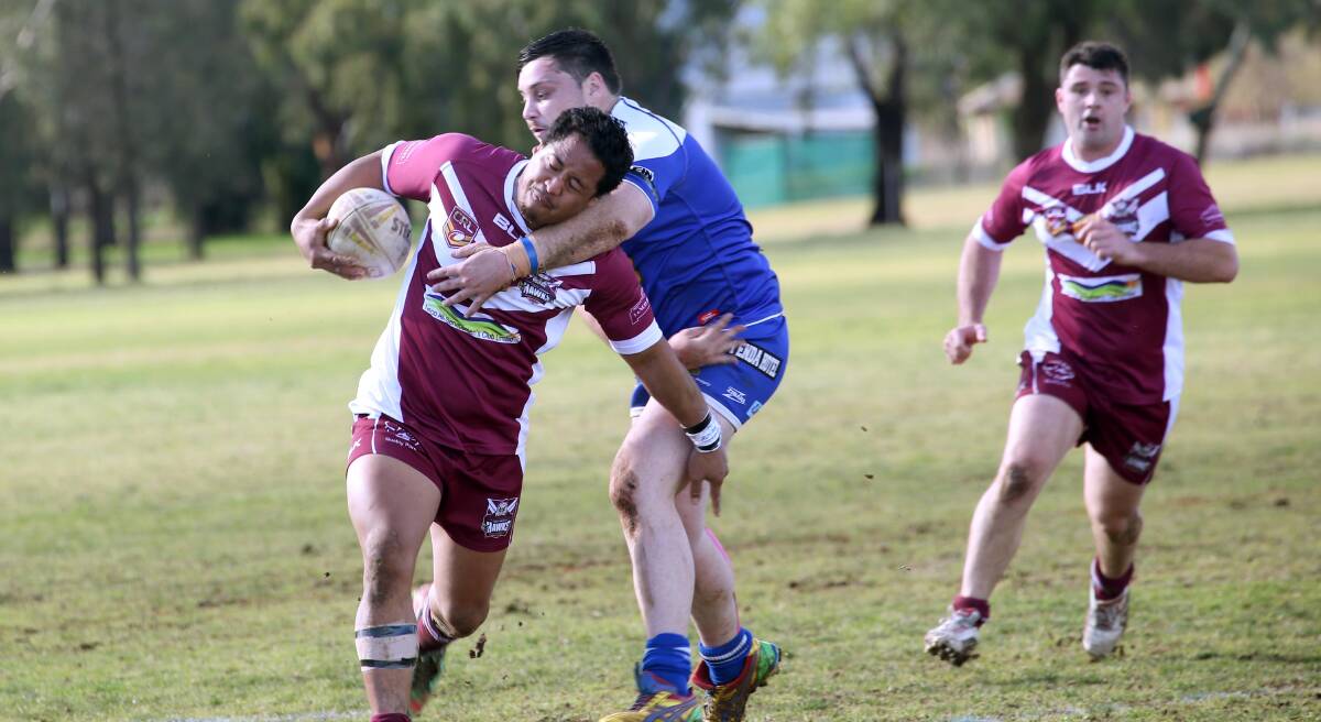 EFFORT: Taina Heke attempts to make his way out of this stranglehold during a recent match. The Hawks went down to West Wyalong on Sunday.