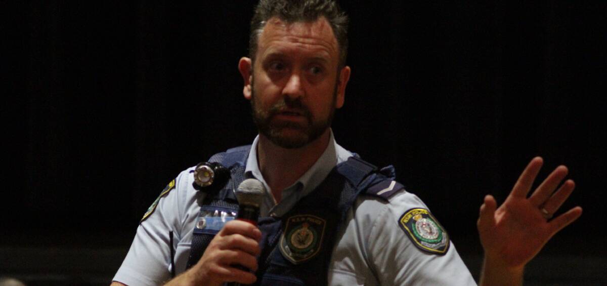 TIME TO ACT: Griffith Local Area Command crime prevention officer Constable Marc Roberts addresses the meeting on Tuesday night. Photo: Ron Arel