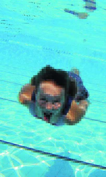 DIVE IN: Bonnie Farrell, 12, laps up the fun at the Leeton Australia Day pool party, which was well attended throughout the afternoon and evening on Monday. 