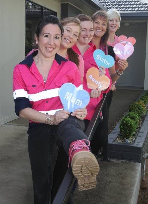 GOOD CAUSE: Xplore Radiology staff (from left) Olivia Symes, Brittany Evans, Kendra Wilson, Toni Bailey and Lisa Harrison in their pink gear. Photo: Talia Pattison