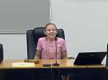 Leeton Out of School Care participant Eloise Robertson tests out the view from the mayoral chair. Picture supplied