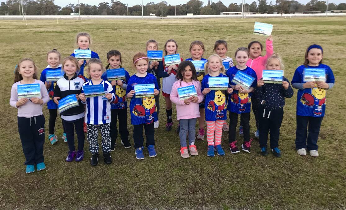 NEW SKILLS: The years four to seven girls' Auskick group with their certificates to signify the end of their first season. Photo: Contributed 
