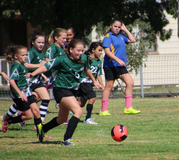RUN: Parkview Public School's Samara McMillan looks to drive the ball forward at the LNPSSA Soccer Championships.