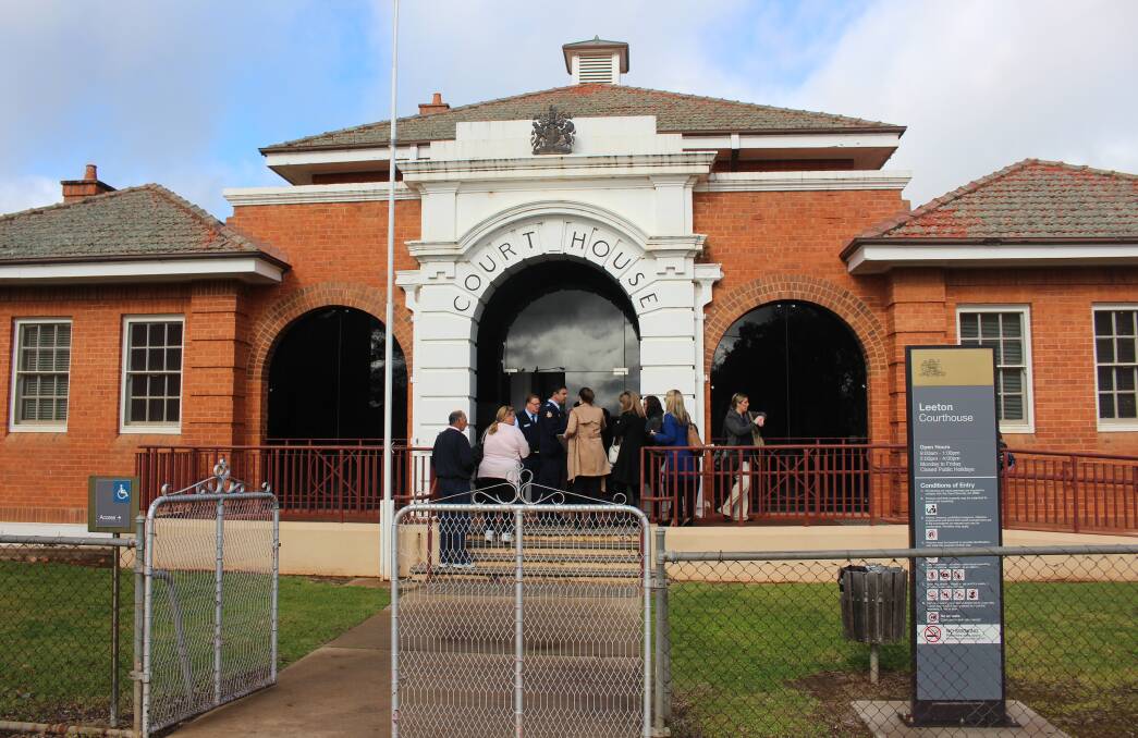 The media gathers outside the Leeton court house last week during the sentencing of Marcus Stanford. Photo: Hannah Higgins