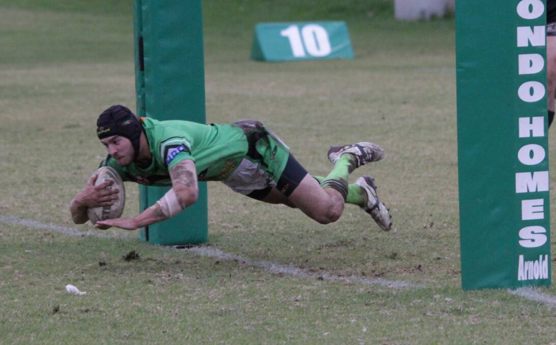 ANOTHER TRY: Danny Maskill of the Leeton Greens put on a stellar performance, contributing heavily to the win by scoring three tries against Hay. Photo: Ron Arel