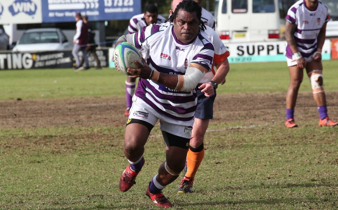 UNSTOPPABLE: Phantoms player Marika Vunibaka charges through a hole in Tumut's line to gain ground for the side on Saturday in Griffith. Photo: Anthony Stipo