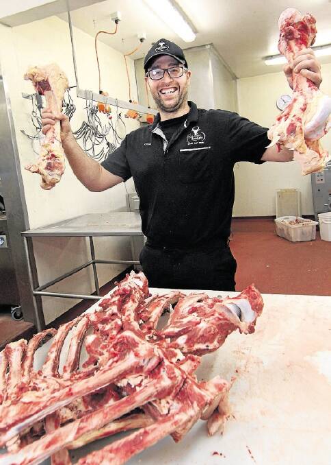 PALEO POWER: Clint Sharman, of Sharman's Butchery, has seen a marked increase in the sale of bones (for bone broth) with the increase in popularity of the Paleo diet. Picture: Grant Wells.
